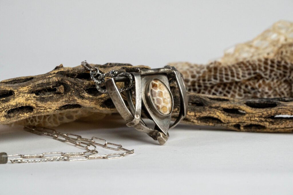 caged freedom necklace from metal smith Reba